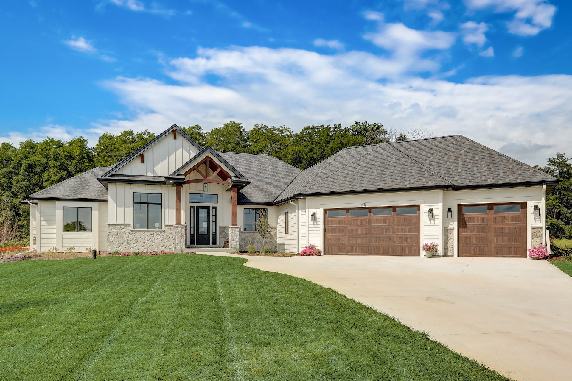 professional real estate photography sample showing blue sky and green grass editing of images